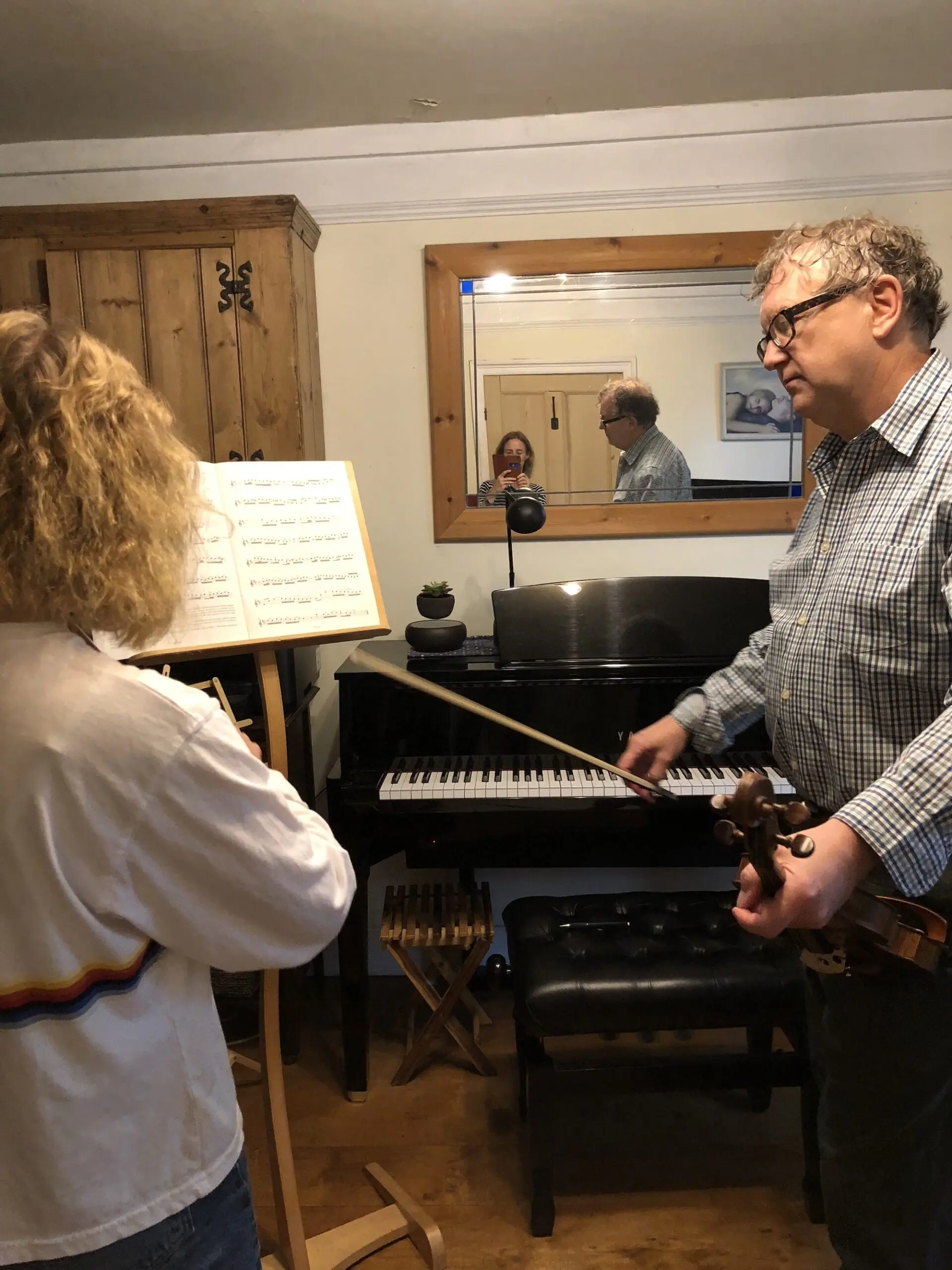 Peter teaching violin