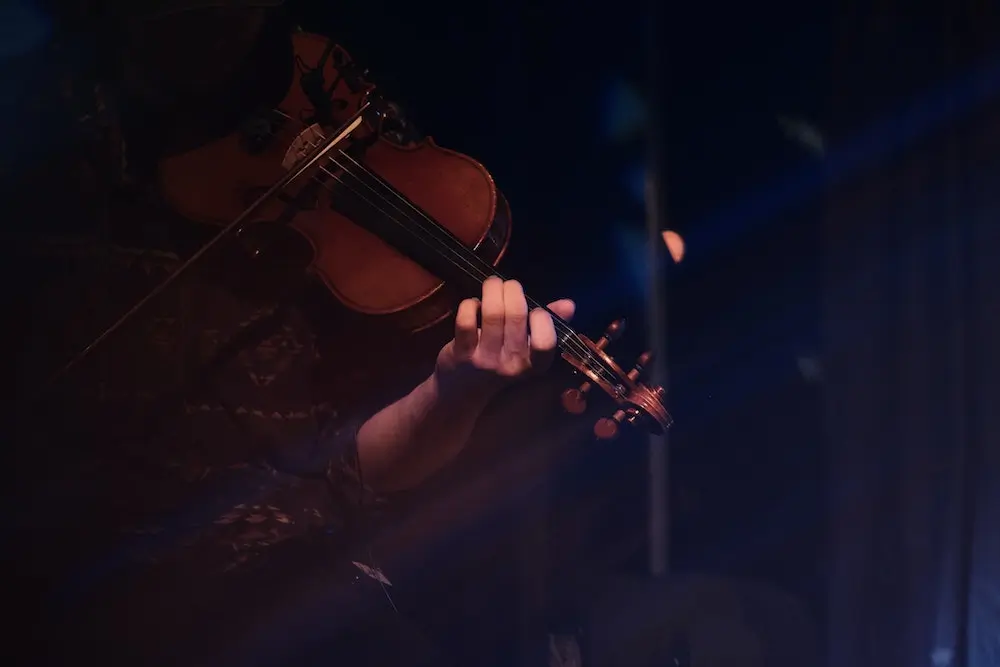 student playing violin